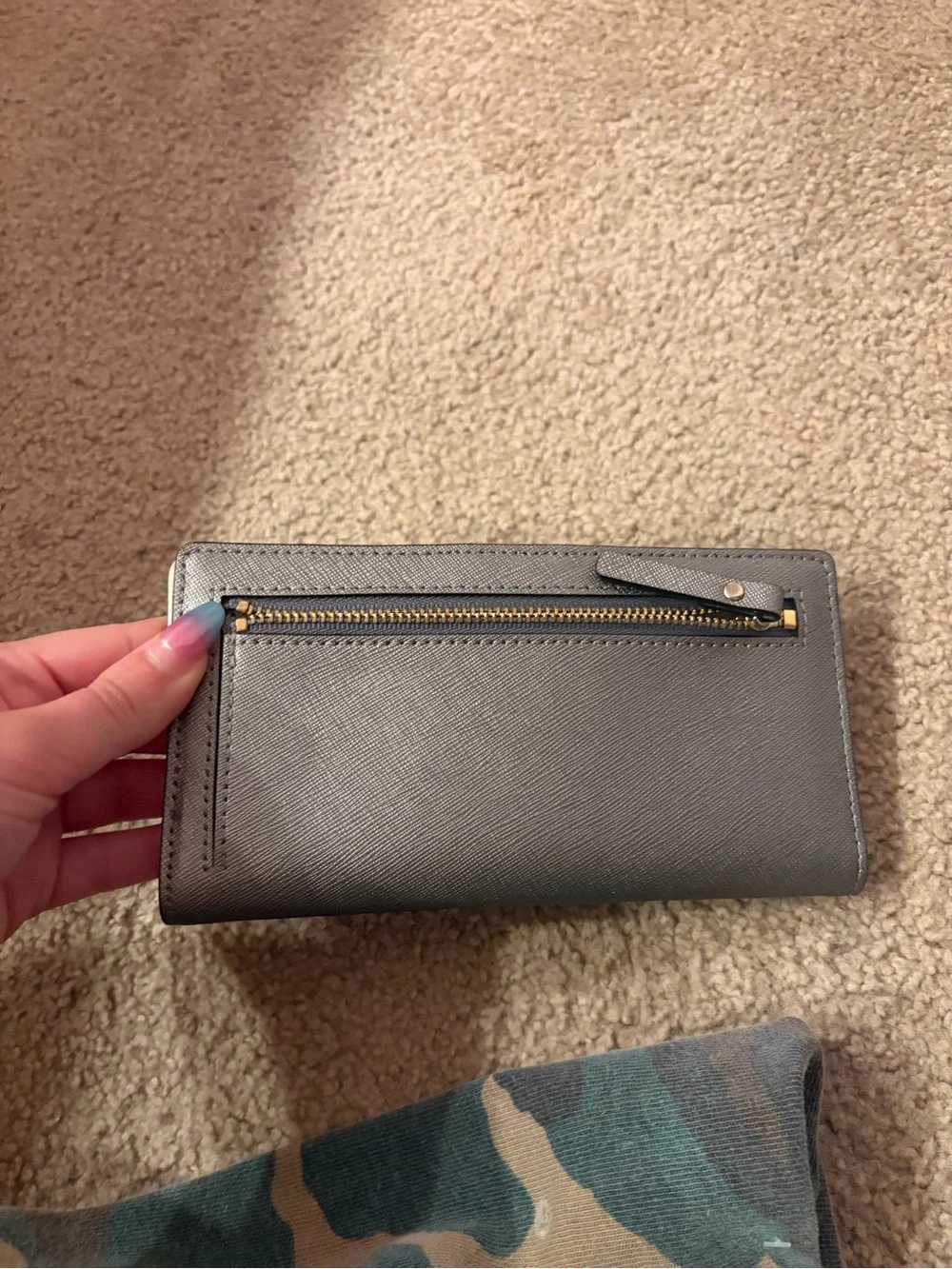kate spade gray card holder with gold logo